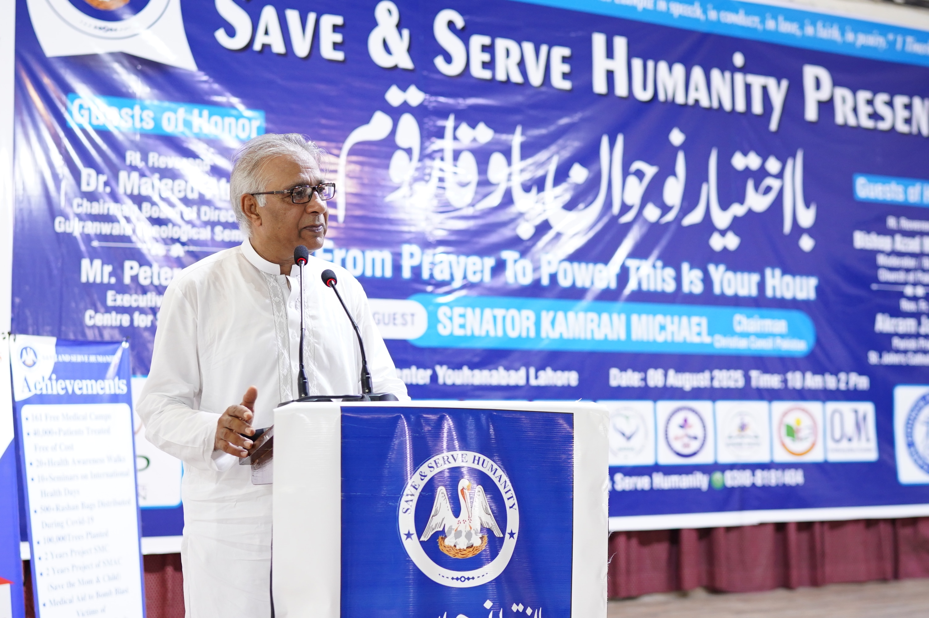 Speaker and participants during the Save and Serve Humanity youth seminar.