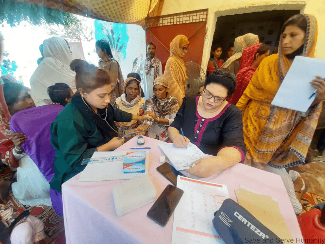 Community members at the Kasur brick-kiln medical camp.